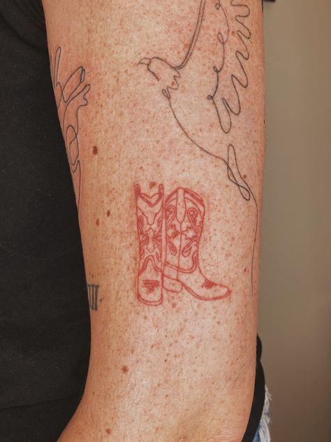 Country Fine Line Tattoo, Red Cowboy Boots Tattoo, Pair Of Boots Tattoo, Western Fine Line Tattoo Ideas, Big Bend Tattoo, Cowboy Boots Tattoos, Red Cowboy Boot Tattoo, Red Ink Fine Line Tattoo, Fine Line Animal Tattoos