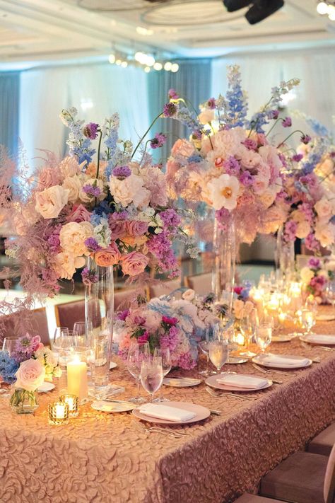 Pink And Purple Wedding Reception, Pink Purple And Blue Party Decorations, Wedding Flowers Pink And Purple, Blue And Pink Table Decor, Pink Purple Blue Centerpieces, Pink Purple Blue Floral Arrangements, Pink Purple And Blue Wedding Colors, Pink And Purple Wedding Aesthetic, Purple Pink Blue Wedding Theme