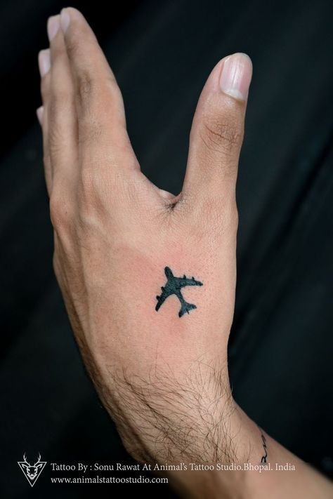 Do you love to travel ? then this plane tattoo is for you #traveling Airplane Hand Tattoo, Travel Tattoo Ideas Men, Basketball Tattoos, Travel Tattoo Small, Airplane Tattoo, Plane Tattoo, Airplane Tattoos, Animals Tattoo, Small Tattoos For Guys