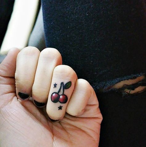 This tiny + colorful cherry finger tattoo is the perfect subtle pop of color to your ring finger. Tattoo Arrow, Cherry Tattoo, Tiny Finger Tattoos, Cherry Tattoos, Finger Tattoo For Women, Finger Tats, Ring Finger Tattoos, Latest Tattoos, Finger Tattoo