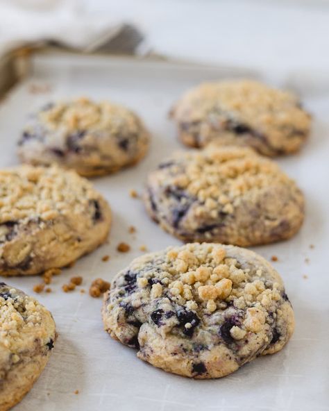 These sweet Crumbl Blueberry Muffin Cookies are easy to make and taste like Crumbl's (but maybe even better!) with lots of blueberry flavor, a soft crumb, and a sprinkle of streusel right on top. An easy copycat recipe that you can make anytime you get the craving for a Blueberry Muffin Cookie! Crumbl Cookie Blueberry Muffin, Blueberry Muffin Cookies Crumbl, Crumble Blueberry Muffin Cookies, Blueberry Muffin Crumble Cookie, Crumbl Blueberry Muffin Cookie, Blueberry Muffin Cookie, Blueberry Crumble Cookies, Muffin Top Cookies, Blueberry Muffin Tops