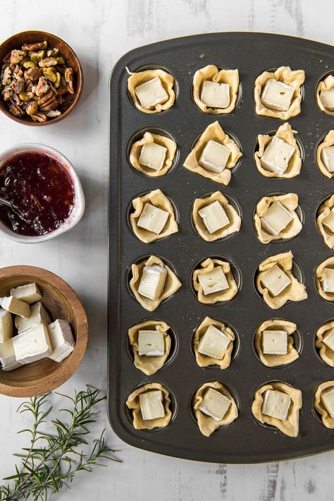 Cranberry Brie Bites (Recipe + Video) - Yellow Bliss Road Baked Brie Bites Crescent Rolls, Wonton Brie Cups, Baked Brie Cups, Brie Cheese Crescent Rolls, Book Club Snack Ideas, Brie Bites Crescent Rolls, Book Club Snacks Appetizers, Book Club Appetizers, Brie Cranberry Appetizer