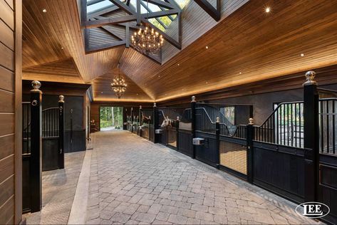 Horse Stable Outside, Horse Ranch Retreat, Modern Horse Stable Design, Modern Stables Horses, Dream Horse Stables, Luxury Stables Exterior, Forest Oaks Equestrian Stable, Luxury Stables Equestrian, Fancy Horse Stables