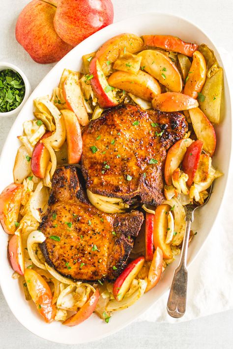 Maple pork chops are roasted on one large sheet pan, along with apples and cabbage for a complete 30 minute meal. The maple marinade keeps the pork chops nice an juicy. A fall time favorite. #30minutemeal #porkchops #fallrecipe #onepanmeal #glutenfreerecipe | robustrecipes.com Maple Marinade, Maple Pork Chops, Maple Pork, Moms Food, Pork Chops With Apples, Pan Pork Chops, Apple Pork Chops, Roasted Apples, Tasty Meat