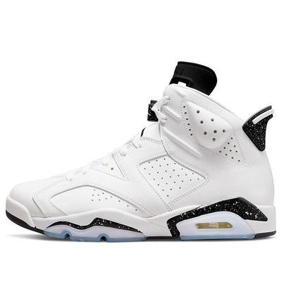 The Air Jordan 6 Retro ‘Reverse Oreo’ is a striking sneaker that combines classic design with modern flair. Its white leather upper features breathable perforations throughout the midfoot and collar. The black two-hole tongue and matching black heel tab, speckled with white, add a unique touch. Jumpman branding on the neoprene lace cover and back heel completes the look. The black polyurethane midsole houses a visible Air-sole unit in the heel, while the translucent rubber outsole provides tract Jordan 11s, Air Jordan 6 Retro, Jordan 6 Retro, Air Jordan 6, Black Heel, Jordan 6, Shoes Shoes, Stylish Sneakers, Black Heels