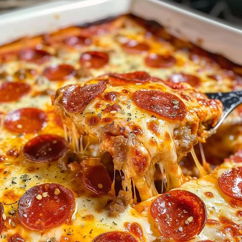 Savor the taste of pizza in a casserole! Bubbling Pizza Casserole is cheesy, hearty, and perfect for a fun family meal, ready in 45 minutes. Ravioli Pizza Bake, Pizza Dough Casserole, Pizza Baked Pasta, Hearty Pizza Casserole Pie, Hamburger Pizza Casserole, Bubble Up Pizza Casserole, Pizza Hotdish Casseroles, Pizza Casserole With Biscuits, Pizza Hotdish