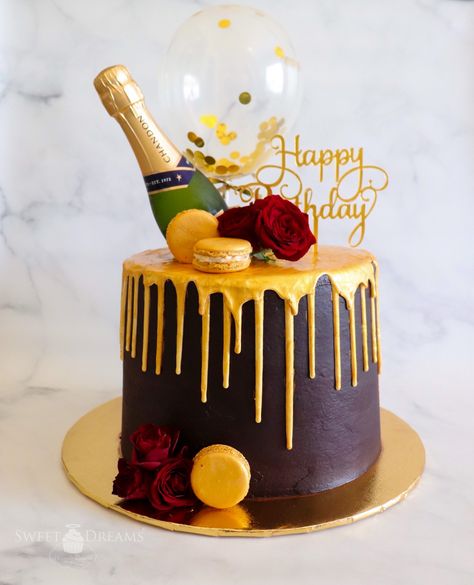 Burgundy Birthday Cake with Gold Drip and Adorned with Macarons, Roses, Mini Champagne Bottle, Glittery Gold Balloon, and Birthday Cake Topper Cake With Beer Bottle, 60 Years Birthday Cake, Burgundy Birthday Cake, Icing Board, Champagne Cakes, Wine Theme Cakes, Cake With Gold Drip, 25th Cake, Champagne Bottle Cake