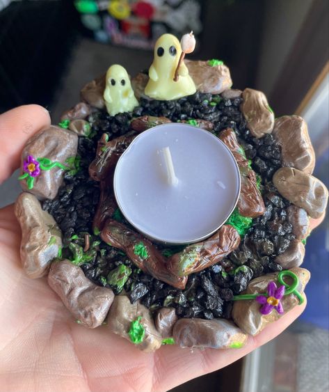 Polymer clay candle holder Polymer Clay Glass Jars, Diy Clay Crystal Holder, Diy Clay Tea Light Holder, Air Dry Clay Witchy Projects, Polymer Clay Tea Light Holder, Witchy Air Dry Clay Crafts, Witchy Clay Ideas, Clay Witchy Crafts, Air Dry Clay Earring Holder