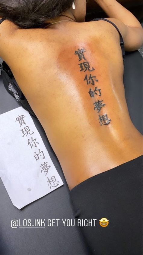 Back Tattoo Women With Butterflies, Spine Tattoo Chinese Symbols, Chinese Symbol Back Tattoo, Back Tattoo Women Japanese Writing, Mid Spine Tattoos For Women, Kanji Spine Tattoo, Hot Spine Tattoos For Women Unique, Back Tattoo Women Chinese, Spine Tattoos For Women Japanese Letters