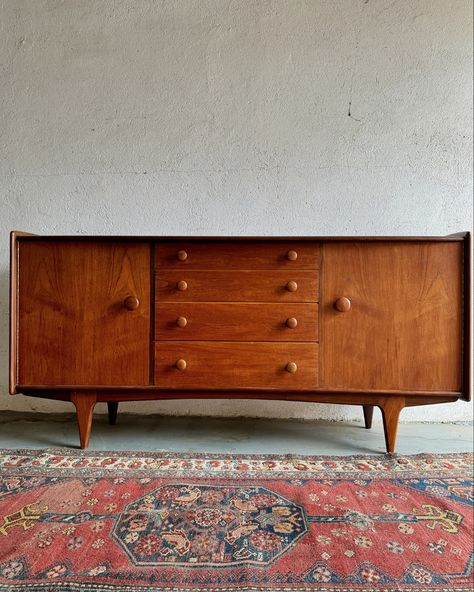 1950s sideboard designed by renowned British designer John Herbert for British furniture makers A Younger Ltd. Part of the ‘ Forsenca ‘ range made from afromosia & teak. A Younger Ltd were British mid century leaders in the 1950s & 1960s, producing low volume, high end pieces. One of the first to be influenced by its Scandinavian contemporaries & that can be seen in this fabulous sideboard. Online now at www.ragandbonebros.co.uk ( link in bio ). #midcenturymodern #midcenturyfurniture #vi... Sideboard Styles, British Furniture, Sideboard Designs, Vintage Sideboard, Furniture Maker, Mid Century Furniture, British Design, The 1950s, Midcentury Modern