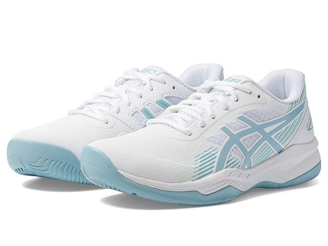 ASICS GEL-Game 8 - Women's Shoes : White/Smoke Blue : Tennis sneakers made for play on hard courts. Lightweight construction for continuous comfort during long hours of wear. Breathable mesh upper with synthetic overlays for added reinforcement and durability. PU FILM covering vamp protects upper from delamination throughout aggressive playing. Built with a wider heel cage to allow for better stability off the rear of the rearfoot. Lace-up closure. Padded tongue and collar. Molded foam footbed. Blue Asics Shoes, Tennis Shoes Blue, Asics Volleyball Shoes Woman, Asics Netball Shoes, Blue Volleyball Shoes, Asics Shoes Volleyball, Asics Shoes Women, Volleyball Shoes Womens, Shoes Volleyball