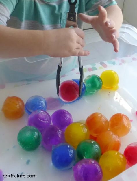 Rainbow Ice Ball Sensory Bin - icy colorful fun! Art Themed Sensory Bin, Ball Study Creative Curriculum Art, Ball Activity For Toddlers, Ball Study Preschool, Balls Creative Curriculum Ideas, Creative Curriculum Ball Study Preschool, Creative Curriculum Balls Study, Preschool Ball Study, Balls Study Creative Curriculum