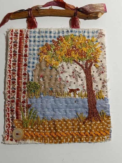 Fall frame of mind is a fun peice with multiple elements of fabric, trim, and embrodiery. Hung by coordinated ribbon from a dried rose stem. Embroidery Square, Boro Stitching, Landscape Art Quilts, Textile Art Embroidery, Textiles Artwork, Fabric Postcards, Woven Wall Art, Wool Embroidery, Framed Embroidery