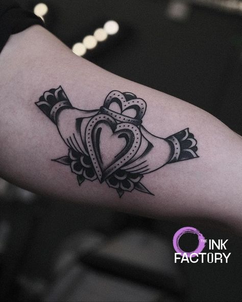 Trad style Claddagh design done by the very talented @chris.c.tattoo . Drop us a DM or email to get booked in! #TheInkFactory #DublinTattoo #Inked #Tattooed #TradStyleTattoo #CladdaghRing #CladdaghTattoo #Irish #IrishTattoo 3blackandGrey #BlackandGreyTattoo American Traditional Claddagh Tattoo, Claughdaugh Tattoo, Irish Sleeve Tattoo, Claddagh Tattoo, Sacred Heart Tattoos, Irish Tattoos, C Tattoo, Couple Tattoo, Claddagh Rings