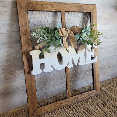 "This chicken wire frame with a beaded wood sign and mini swag will be a definite conversational piece! A cute way to decorate your favorite wall or console table!  Attached is a saw tooth hook for hanging! Choose your own wood stain! Item measures: 16\" W x 20\" H x .6\" D Frame only is also available! As shown: Barnwood" Over Doorway Decor, Old Window Picture Frame Diy, Chicken Wire Frame Ideas, Dollar Tree Crafts Home Decor, Chicken Wire Frame Decor, Chicken Wire Bulletin Board, Country Farmhouse Wall Decor, Chicken Wire Projects, Frame With Wreath