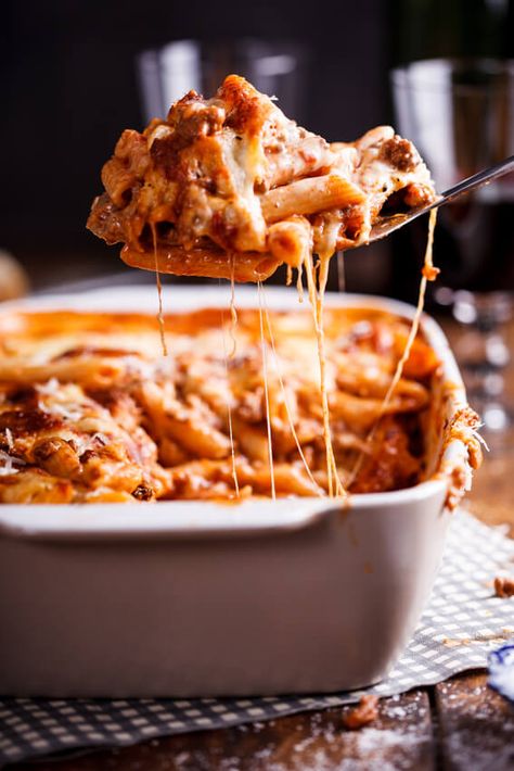 This rich and aromatic bolognese pasta bake is perfect for busy weeknights or feeding a crowd as it can easily be made in bulk and frozen. #comfortfood #winterdinner #dinnerrecipe #easyrecipe #pasta #casserole #pastabake #bolognese No Meat Pasta, Ziti With Sausage, Cheesy Baked Ziti, Bolognese Pasta Bake, Ziti Al Forno, Baked Ziti With Sausage, Bolognese Pasta, Baked Pasta Dishes, Easy Baked Ziti