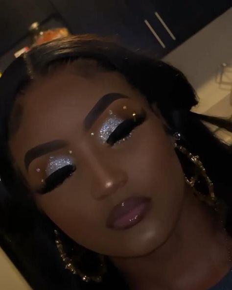 PIN: LAASHAI 💕 [Video] | Bombshell makeup, Glitter makeup looks, Birthday makeup looks Makeup Looks For Black And Silver Dress, Sliver Glitter Make Up Looks, Diamond Makeup Looks Black Women, Makeup Ideas With Rhinestones, Sliver Eyeshadow, Silver Makeup Looks For Black Women, Eyeshadow With Rhinestones, Prom Makeup For Red Dress, Silver Prom Makeup