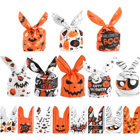 PRICES MAY VARY. Package Content: 100 pieces of Halloween candy bags in 8 Halloween themed patterns suitable for packaging and decorating desserts. Size: Our Halloween candy bags measure about 22.3 x 13.72cm / 8.78 x 5.4in, smal light, fine beautiful. Material: The sweet bags are made of premium material, touch soft than normal plastic bag, thick, not easy to tear, reusable. Design: The Halloween bags for candy are designed with rabbit ears, cute shape, is convenient for you to pack snacks Wide Halloween Rabbit, Decorating Desserts, Candy Cookie, Halloween Candy Bags, School Treats, Sweet Bags, Halloween Party Supplies, Candy Cookies, Packaging Bag