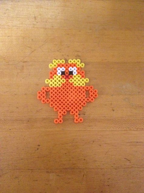 The Lorax Perler beads created by Simspon family for Read Across America Day. Thing To Make With Perler Beads, Pearl Beads Designs, Things To Make Out Of Fuse Beads, Disney Hamma Beads Ideas, Melt Bead Designs, The Lorax Perler Bead, Ironed Beads Ideas, Cute Pearled Bead Ideas, Pealed Bead Ideas