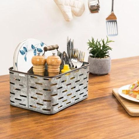 With rustic galvanized metal, 4 compartments, and a sturdy wood handle, this utensil caddy will make sure you are ready for entertaining and day to day dining! This utensil caddy is an essential serving accessory! This basket adds unique farmhouse-style design to any space, while enable you to carry condiments, flatware, and more easy from room to room. Whether used to keep flatware accessible at your dining table, at a picnic, in a restaurant or cafe setting, or even to organize beauty products Cafe Setting, Unique Kitchen Utensils, Wood Tea Box, Kitchen Utensil Storage, Flatware Caddy, Utensil Caddy, Wood Barn Door, Utensil Storage, Metal End Tables