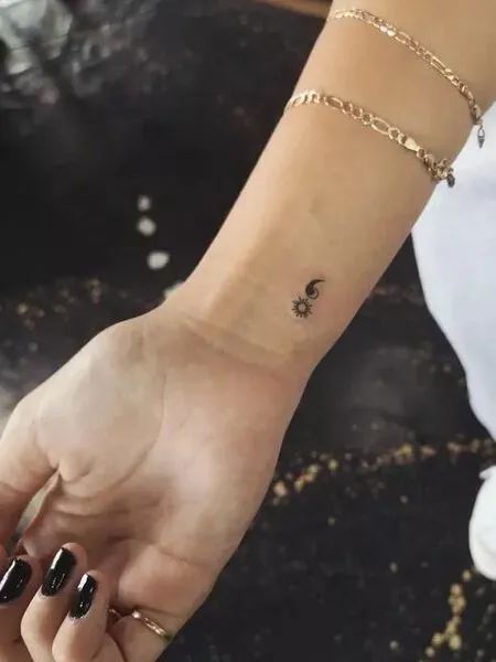 Tattoo Of Semicolon, Sun And Moon Tattoo Semi Colon, Wrist Tattoos For Women Semicolon, Semi-colon Tattoo Ideas Wrist Small, Cute Semicolon Tattoos, Cute Small Semicolon Tattoo, Finger Tattoos Semicolon, Self-love Tattoo Ideas Small, Semicolon Tattoo Design