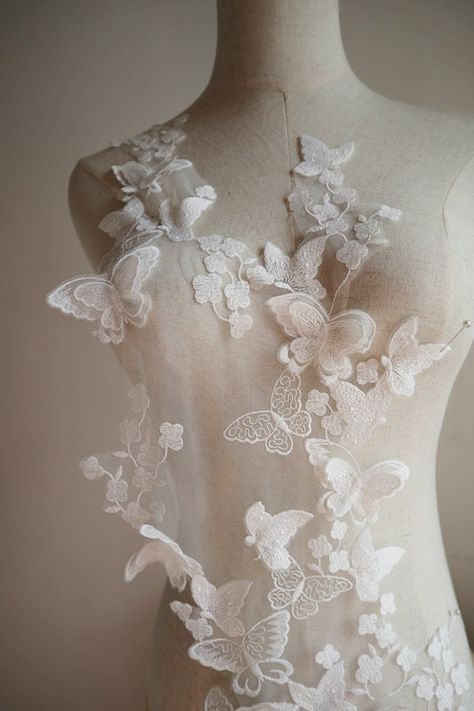 off white butterfly embroidered Lace Applique, 3d butterflies Veil Applique for Wedding Gown, Bridal Dress Decor Bodice lace accessories by BettyLaceShow on Etsy https://www.etsy.com/listing/683991284/off-white-butterfly-embroidered-lace Wedding Evening Gown, Butterfly Lace, Bridal Applique, Lace Accessories, Bridal Lace Fabric, Butterfly Wedding, Embroidered Lace Fabric, 3d Butterfly, Wedding Costumes