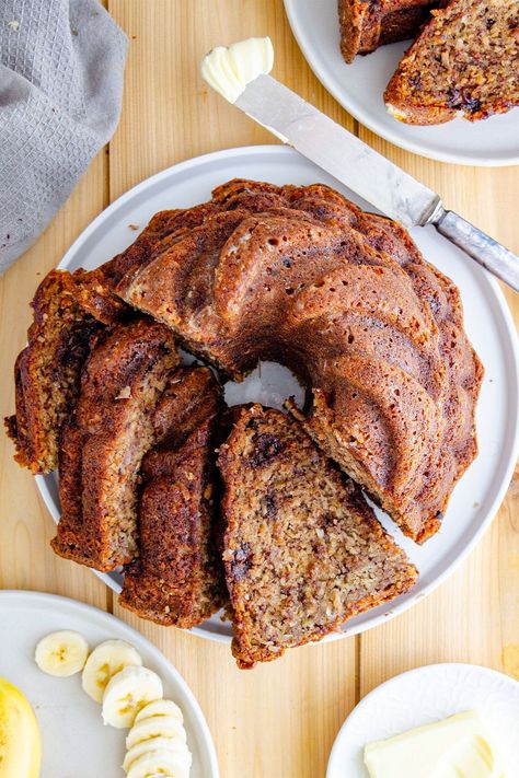 This viral banana bread is popular for a reason. It’s delicious! Simple to make, the moist and rich banana bread is about as decadent as it gets. Made with fresh banana, coconut, and chunks of chocolate this banana bread is baked in a bundt pan making it extra tender and moist. This will be your go-to banana bread recipe. King Arthur Banana Bread Recipe, Famous Banana Bread Recipe, Ultimate Banana Bread Recipe, Chrissy Teigen Recipes, Rich Banana Bread, Bundt Pan Recipes, Banana Bundt Cake, Banana Bundt, Bundt Recipes