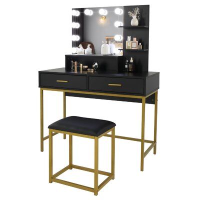 Looking for a dressing table that not only suits a modern aesthetic but also settles storage on the vanity? Then this is it! This is a super functional, modern-style vanity set that comes from Everly Quinn. Also features a lighted mirror and matching stool. | Everly Quinn Ronalie 39.37" Wide Vanity Set w/ Stool and Mirror Black 53.35 x 39.37 x 17.72 in, Wood | C008400196 | Wayfair Canada Modern Vanity Table Bedroom Blac, Black Vanity Set, Makeup Dressing Table, Dresser Desk, Rhinestone Projects, Large Vanity, Illuminated Mirrors, Lighted Vanity Mirror, Lighted Mirror