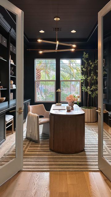 Jill Higginson on Instagram: "Would you dare to drench a room in black paint? 

Comment SHOP below to receive a DM with the link to shop this post on my LTK ⬇ https://liketk.it/4MHfK

Home office - paint color is Tricorn black by Sherwin Williams  #ltkhome #ltkvideo #ltkstyletip" Merry Everything And Happy Always, Moody Office, Office Paint Colors, Merry Everything, Office Paint, Study Inspo, Grey Dining, Office Inspiration, Home Office Design