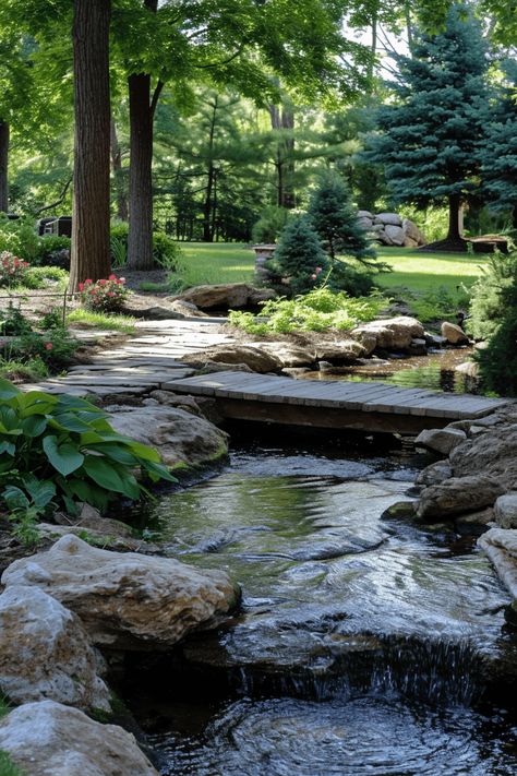 22 Innovative Backyard Stream Ideas (With Pictures) Water Creek Landscaping, Landscape Stream Ideas, Creek Garden Ideas, Backyard With Creek, Natural Stream Landscaping, Home Water Features Indoor, Waterfall Stream Backyard, Stream In Backyard, Natural Rock Water Feature