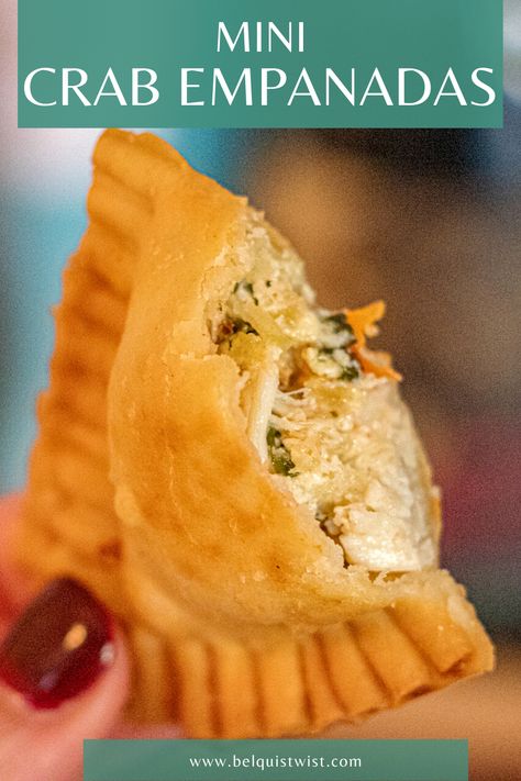 Tight closeup of a mini crab empanada with a bite taken from it. Crab Empanadas Recipe, Seafood Hand Pies, Dominican Appetizers For Party, Seafood Empanadas, Seafood Empanadas Recipe, Shrimp Empanadas Recipe, Empanada Appetizer, Crawfish Empanadas, Empanada Filling Recipes