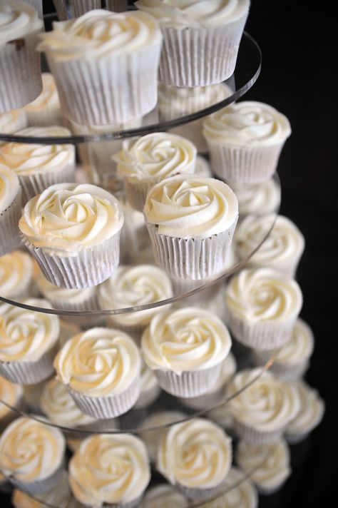 Simple and elegant white cupcakes.    Find out more about our wedding photography at: www.littlephotocompany.co.uk White Rose Cupcakes Wedding, Modern Wedding Cupcakes, Wedding Eclairs, White Cupcakes Decoration, Wedding Cupcakes Ideas Simple, Simple Wedding Cupcakes, Wedding Cupcakes Ideas Elegant, White Rose Cupcakes, Cupcakes Aesthetic