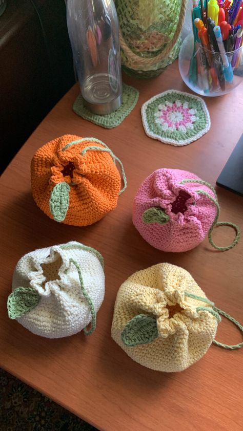 crocheted yarn used to create a drawstring pouch. color customizable Crochet Gift Pouch, Small Bags Crochet, Small Crochet Trinkets, Small Summer Crochet Projects, Small Crochet Pouch Pattern, Crochet Bag Drawstring, Drawstring Crochet Pouch, Summer Crochet Projects To Sell, Crochet Market Ideas To Sell