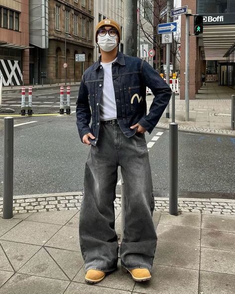 How about his color? 🛰️ 📸 @jira.exe 🇩🇪 🧢Hat : carhartt 👔Top : evisu 👖Bottom : trendtvision 👞Shoes : timberland Unlock the style with an “Evisu” deep blue denim printed jacket, layered over a white inner shirt for a classic touch. Paired with “Trendtvision” baggy gray jeans, the shirt is neatly tucked in for a polished look. Complete the ensemble with “Timberland” boots and top it off with a “Carhartt” yellow beanie for a pop of color. This outfit effortlessly blends streetwear vibes w... Outfits With White Shoes Men, Deep Blue Jeans Outfit Men, Dark Blue Denim Jacket Outfit Men, Shoes For Baggy Jeans, Dark Blue Denim Jacket Outfit, Evisu Jeans Outfit, Outfit With Beanie, Gray Jeans Outfit, Blue Denim Outfit