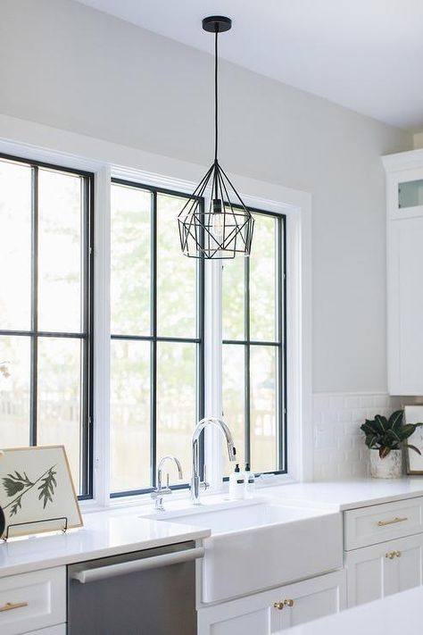 White Shaker Cabinets with Farmhouse Sink - Transitional - Kitchen Light Above Kitchen Sink, Above Kitchen Sink, Over Kitchen Sink, Kitchen Sink Lighting, Kitchen Sink Window, Best Kitchen Sinks, Kitchen Styles, Home Bunch, White Shaker Cabinets