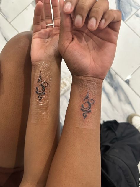 matching tattoo, meaningful tattoo, breathe, tattoos Pretty Tattoos Spiritual, Abundance Tattoos For Women, Tattoos For Struggle, Tattoos That Represent Loyalty, Om Tattoo Black Women, God Sister Tattoos, Matching Tattoos On Wrist, Spiritual Baddie Tattoos, Matching Tattoos Spiritual