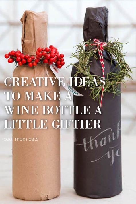 8 creative ideas for gift wrapping wine, like using kraft paper with a Christmas flourish | Terrain via Boston Mamas. | See more on CoolMomPicks.com #wine #giftwrap #holidaydiy | wine gift | champagne gift wrap | diy giftwrap | creative gift wrap ideas | christmas gift wrap ideas | hostess gifts Ways To Wrap Wine Bottles, How To Wrap Wine Bottles Gift, Wrapping Wine Bottles Gift Ideas, Wrap A Bottle, Wine Bottles Gift Wrap, Wine Gift Wrapping, Holiday Wine Gift, Wine Package, Bottle Gift Wrapping