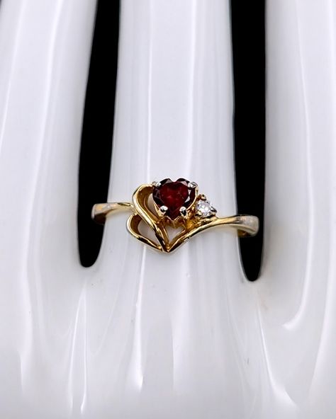 Stamp: Hong Kong Gemstone: Garnet Shape: Heart Color: Red, white, gold Carat: .45 Ring size: 8 Condition: Good vintage condition with light signs of wear. Some fading of gold plating on band. Tested with Official Presidium II Gem Tester for Accuracy *Please see photos for more details. Lighted Signs, Gold Plating, Garnet, Hong Kong, Red White, Ring Size, Gold Plate, Gems, White Gold