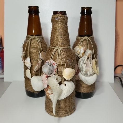 New! Upcycled Handmade Sea Shells Beach Nautical Rustic Set Of 3 Wrapped With Twine Natural Colored Hemp Dark Colored Bottles Upcycle Beach Nautical Handmade Table Decor Accents Summer All Sea Shells Were Hand Picked By Me And Are From Sanibel Island Florida. Made With Love And Care. Sea Theme Decorations, Twine Wrapped Bottles, Nautical Bottle, Wrapped Bottles, Beach Bottle, Colored Bottles, Seashell Art Diy, Coastal Crafts, Shells Beach