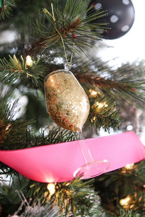 Wine glass ornament. This year's dream tree is full of pinks, blues, and greens! Come see this Kate Spade inspired colorful Christmas tree with lots of sass! It features hot pink ribbon, gold, glitter, polka dots, and stripes! #katespade #girlychristmas #christmastree #christmastreedecor Glamorous Christmas Tree, Round Christmas Ornaments, Hot Pink Ribbon, Black Gold Christmas, Glamorous Christmas, Christmas Tunes, Diy Playbook, Kate Spade Inspired, Buffalo Check Christmas