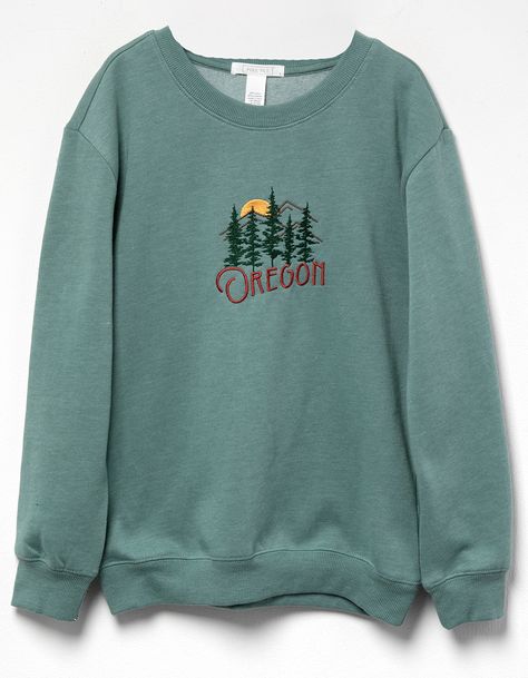 Full Tilt Oregon Embroidered Crewneck Sweatshirt. Embroidered Artwork At Center Chest. Ribbed Crew Neckline. Cuffed Long Sleeves And Hem. Fleece Lining. Lightweight. 55% Cotton, 45% Polyester. Machine Wash. Imported. | Full Tilt Oregon Girls Embroidered Crewneck Sweatshirt Cute Sweatshirts Aesthetic, Embroidered Fleece Crew Sweatshirt, Retro Crew Neck Sweatshirt With Embroidered Graphics, Vintage Embroidered Crew Sweatshirt, Crewneck Design Ideas, Green Embroidered Crew Neck Hoodie, Fall Merch, 90s Embroidered Long Sleeve Sweatshirt, Fabric Outfits