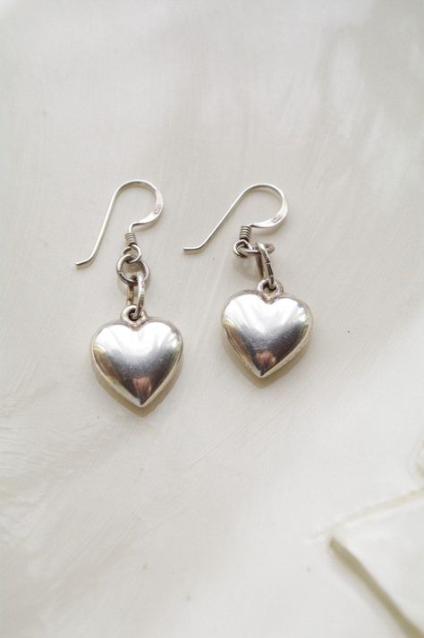 Bursting with Love Puffed Heart Silver Earrings Sterling silver heart earrings!! Dangle earrings. Heart charm earrings. Makes a wonderful sweet sixteen gift! Thank you so much for stopping by! Don't forget to convo me should you have any questions whatsoever! Have a great AND wonderful AND exceptional day!! Please check my other items: http://www.etsy.com/shop/HeartsandCandy facebook: https://www.facebook.com/HeartsandCandy Silver Heart Dangle Earrings, Dainty Silver Earrings, Sweet Sixteen Gifts, Sterling Silver Heart Earrings, Simple Silver Jewelry, Indie Jewelry, Silver Heart Earrings, Earrings Heart, Puffed Heart