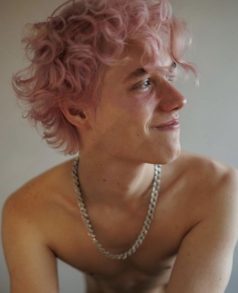 Guy Dyed Hair Aesthetic, Mens Pastel Hair, Pink Hair On Guys, Pink Hair Guy Aesthetic, Pink Curly Hair Men, Pink Mullet Men, Curly Hair Dye Men, Rose Gold Hair Men, Split Bleached Hair