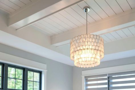 Black windows and nickel shiplap ceiling with a hanging pendant light Nickel Gap Paneling, Nickel Gap Ceiling, Nickel Gap Shiplap, Nickel Gap, Shiplap Boards, Shiplap Ceiling, Hanging Pendant Light, Modern Farmhouse Living Room, Black Windows