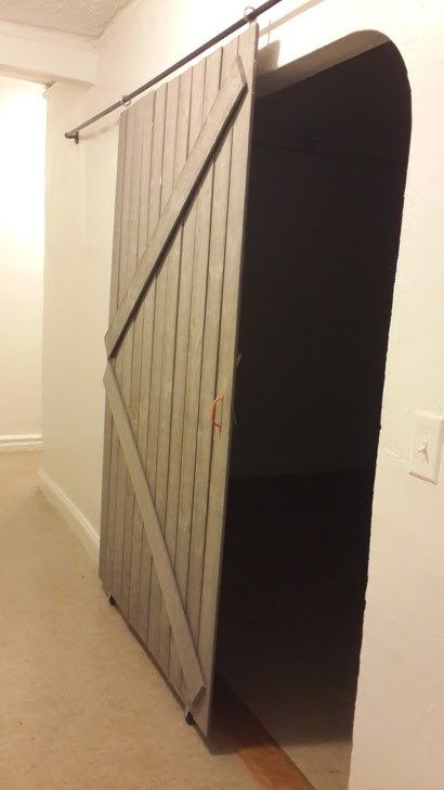 Remodelaholic | DIY Sliding Barn Door + Inexpensive Hardware Diy Sliding Door Cheap, Cheap Room Dividers, Small Room Divider, Temporary Room Dividers, Room Divider Bookcase, Fabric Room Dividers, Portable Room Dividers, Diy Sliding Door, Glass Room Divider