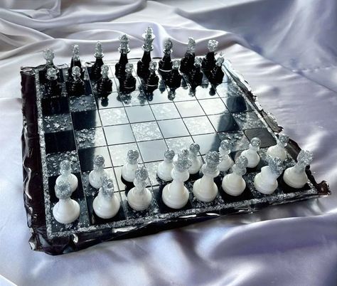 Handmade black white Chess set made of epoxy resin with chess figures |Chess pieces resin|Resin Chessboard|Resin Art|Board Game| Chess gift Exclusive chess in a single copy made of epoxy resin. The game board is made in the form of a piece of ice, it looks very impressive. ✅️ chess board - 1 pc.; ✅️ chess pieces - 32 pcs.; *Chessboard size: 31x31 cm; thickness height 2.5 cm *Chess pieces: new, solid (without seams), sizes: from 3.40 cm (pawn height) to 6.77 cm (king height), diameter from 2.0 cm (pawn) to 2.5 cm (king) Chess Resin, Resin Games, Chess Figures, Chess Gifts, Chess Set Unique, Pearl Ex, Father And Baby, Diy Resin Projects, Epoxy Resin Crafts