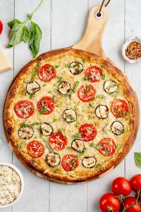 Learn how to make a delicious vegan white pizza with zucchini and tomatoes. It's simple to make, loaded with flavor, and can be made on either the grill or in the oven. #vegan #pizza #whitepizza #sweetsimplevegan #grilled #veganfood #entree Vegan White Pizza, Pizza Blanca, Zucchini And Tomatoes, Pizza Vegana, Tofu Ricotta, Vegan Ricotta, Zucchini Tomato, Best Homemade Pizza, Vegan Mozzarella