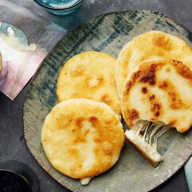 Cheese-Stuffed Arepas by Food Network Kitchen Stuffed Arepas, Venezuelan Recipes, White Corn Meal, Arepas Recipe, Vegan Mexican Recipes, Colombian Food, Corn Cakes, Vegan Gluten Free Recipes, Cheese Stuffed