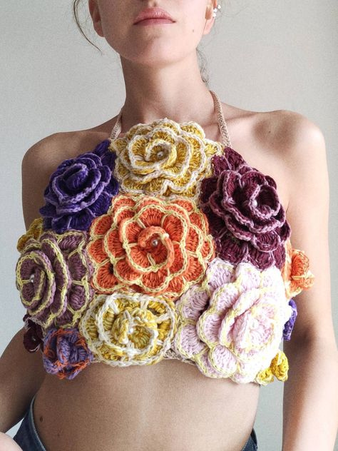 crochet patterns-Free Patterns: Easy Crochet Tops for Every Season-Cozy Crochet Tops: Easy and Cute Crochet Halter Tops Flower, Clothes Made Of Flowers, Crochet Top 2023, Crochet Flowers On Clothes, Avant Garde Crochet Fashion, Abstract Crochet Top, Surface Crochet Flower, Crochet Flowers Top, Crochet Leaf Top