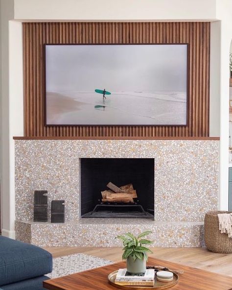 concrete collaborative on Instagram: "warmth and style 🤎 // ⠀⠀⠀⠀⠀⠀⠀⠀⠀ a touch of terrazzo never hurts 〰️ venice shale large marble and yellow chip as tile fireplace surround for this residential project design by @blytheinteriors  ⠀⠀⠀⠀⠀⠀⠀⠀⠀ 📸 @nataliarobertphoto" Terrazzo Fireplace, Tile Fireplace Surround, Concrete Collaborative, Tile Fireplace, Fireplace Tile Surround, Fireplace Surround, Fireplace Tile, Project Design, Fireplace Surrounds